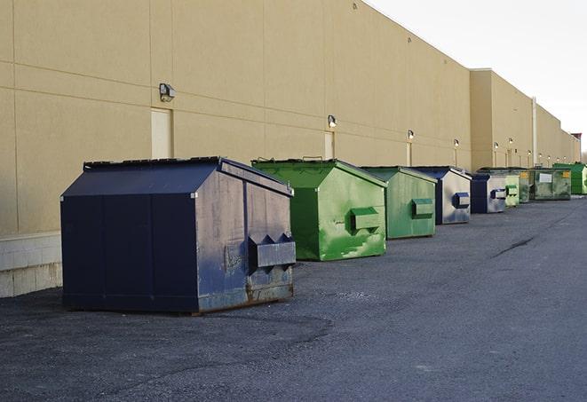 a group of dumpsters lined up along the street ready for use in a large-scale construction project in Beverly Hills